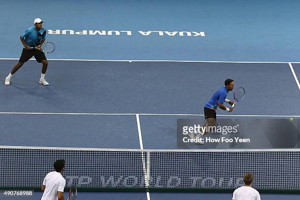 Raven Klaasen of RSA and Rajeev Ram of USA competes against Rameez Junaid of Australia and Jonathan Marray of Germany during the 2015 ATP Malaysian...