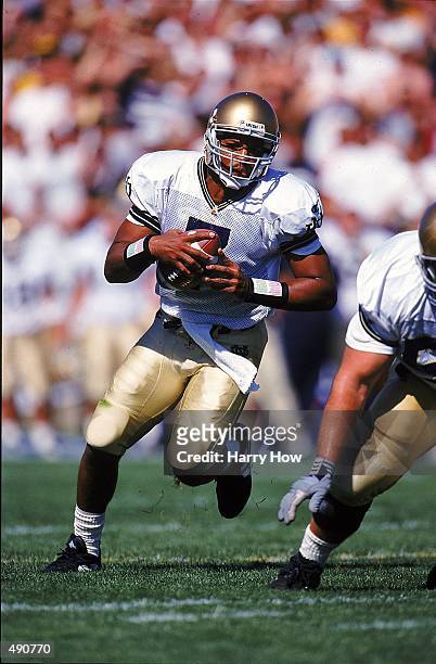 Quarterback Jarious Jackson of the Notre Dame Fighting Irish runs with the ball during the game against the Purdue Boilermakers at the Ross-Ade...