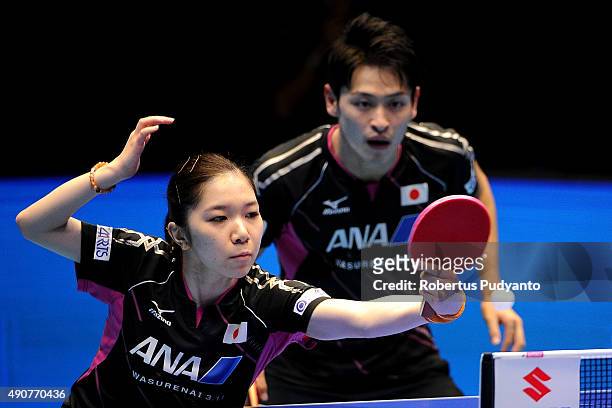 Oshima Yuya and Wakamiya Misako of Japan compete against Fan Zhendong and Chen Meng of China during Mixed doubles semi-final match of the 22nd 2015...