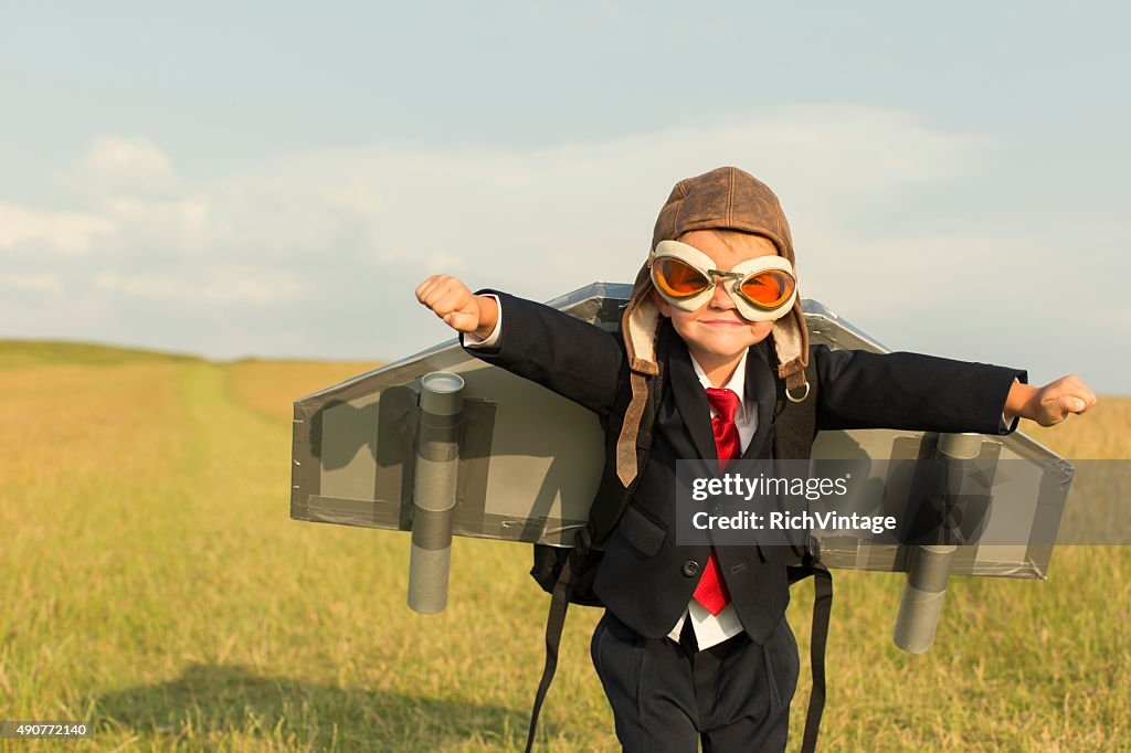 Young Boy Businessman Wearing Jetpack in England