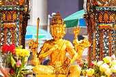 Three headed golden statue Erawan shrine