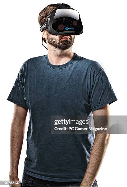 Portrait of a man wearing an Oculus Rift virtual reality head-mounted display, taken on October 3, 2013.