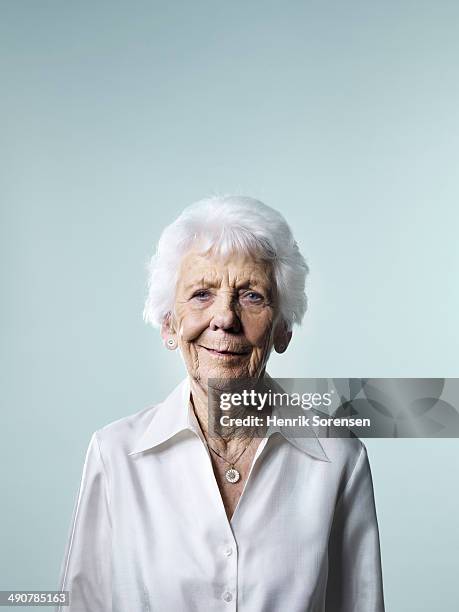 mature woman - senior studio portrait stockfoto's en -beelden