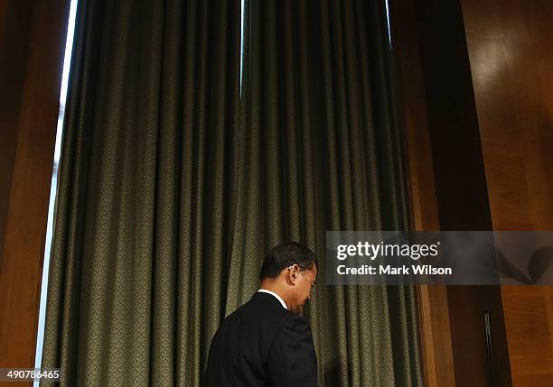 Veterans Affairs Secretary Eric Shinseki arrives at a Senate Veterans' Affairs Committee hearing that is focusing on wait times veterans face to get...