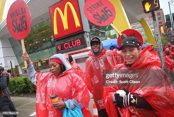 Fast food workers and activists demonstrate outside McDonald's downtown flagship restaurant on May 15, 2014 in Chicago, Illinois. The demonstration...
