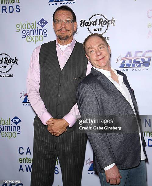 Penn Jillette and Teller of the comedy/magic team Penn & Teller attend Global Gaming Expo's Casino Entertainment Awards at Vinyl inside the Hard Rock...