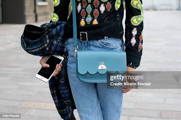 Teen Vogue Senior Fashion Market and Accessories Editor Jessica Minkoff wears a Love Moschino jacket, Peter Pilotto top, vintage jeans and a...