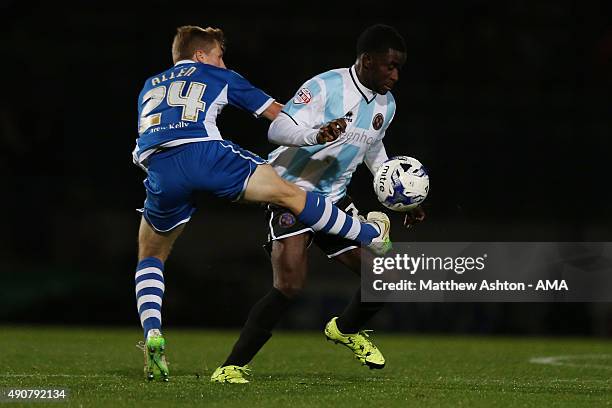 Jamie Allen of Rochdale and Larnell Cole of Shrewsbury Town during the Sky Bet League One match between Rochdale and Shrewsbury Town at Spotland...