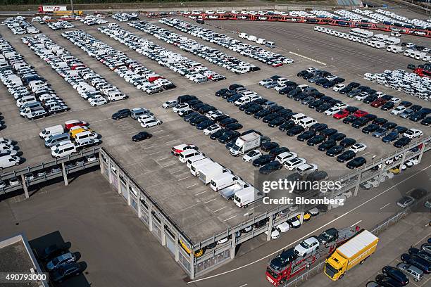 An aerial view of automobiles stockpiled at the Swiss auto distributor AMAG, a unit of Careal Holding AG, with brands including VW Volkswagen AG,...