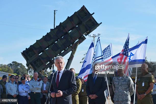 Defense Secretary Chuck Hagel stands in front of a Patriot missile battery while speaking to U.S. And Israeli troops after viewing Juniper Cobra 14...