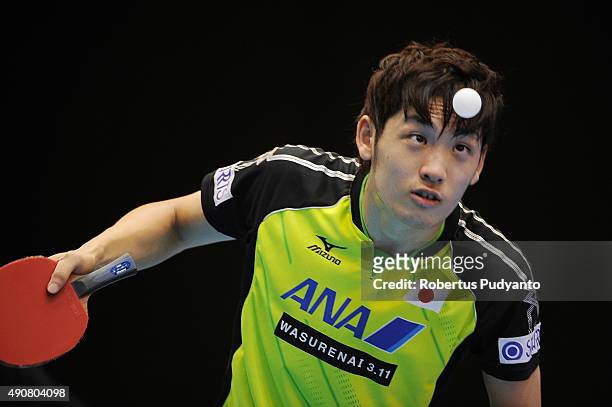 Muramatsu Yuto of Japan competes against Jang Woojin of South Korea during Men's singles round 32 match of the 22nd 2015 ITTF Asian Table Tennis...