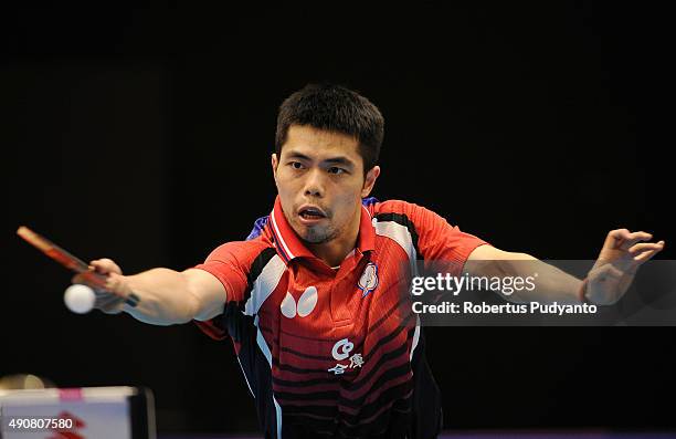 Chuang Chih-Yuan of Taipei competes against Choe Il of DPR Korea during Men's singles round 16 match of the 22nd 2015 ITTF Asian Table Tennis...