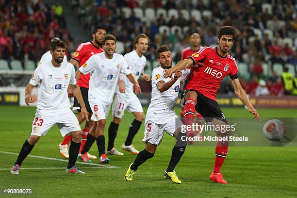 Andre Gomes of SL Benfica holds off Diogo Figueiras of Sevilla Fduring the UEFA Europa League Final between Sevilla FC and SL Benfica at Juventus...