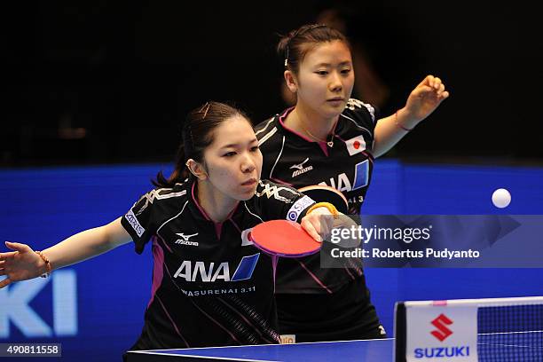 Fukuhara Ai and Wakamiya Misako of Japan compete against Kim Hye Song and Ri Mi Gyong of DPR Korea during Women's doubles quarter-final match of the...