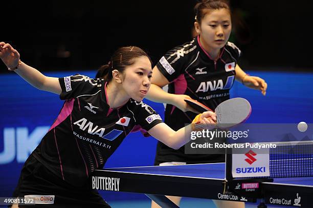 Fukuhara Ai and Wakamiya Misako of Japan compete against Kim Hye Song and Ri Mi Gyong of DPR Korea during Women's doubles quarter-final match of the...