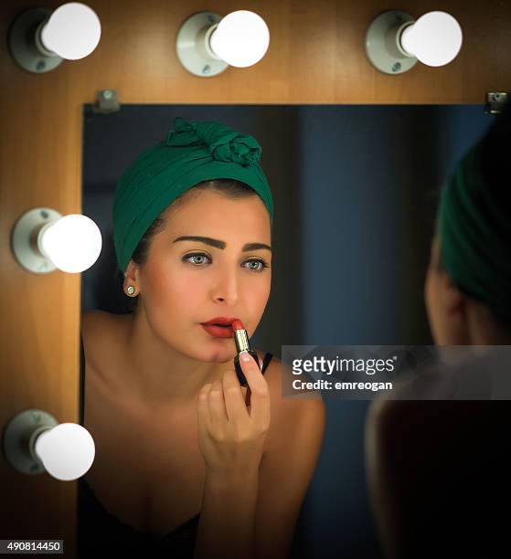 actress applies makeup backstage - boudoir stockfoto's en -beelden