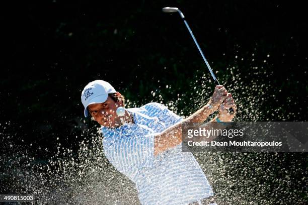 Thomas Aiken of South Africa hits his third shot on the 15th hole out of the bunker during Day 1 of the Open de Espana held at PGA Catalunya Resort...