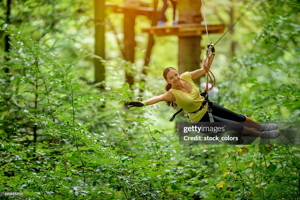 Flying over forest with zip line