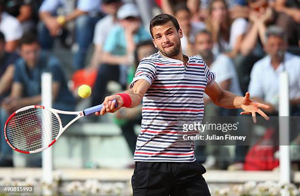 Grigor Dimitrov of Bulgaria plays a forehand in his match against Tomas Berdych of Czech Republic during day five of the Internazionali BNL d'Italia...