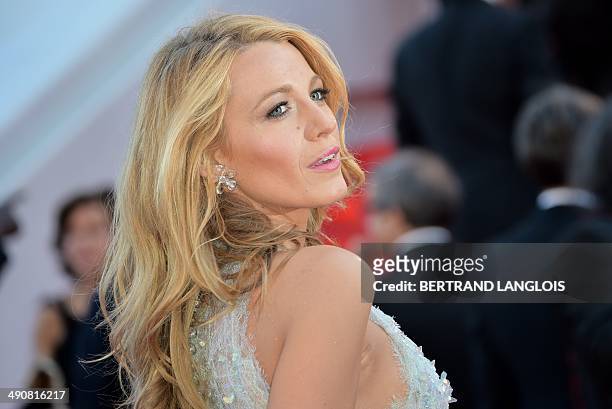 Actress Blake Lively poses as she arrives for the screening of the film "Mr. Turner" at the 67th edition of the Cannes Film Festival in Cannes,...