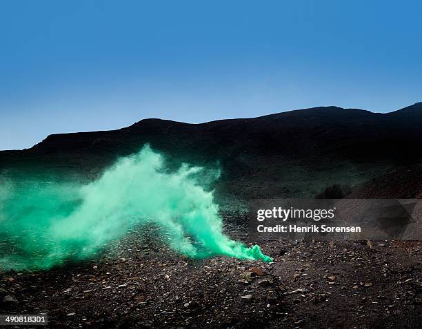 Green smoke in desert