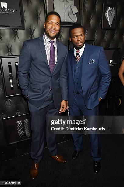 Personality Michael Strahan and Curtis "50 Cent" Jackson III attend JCPenney and Michael Strahan's launch of Collection by Michael Strahan on...