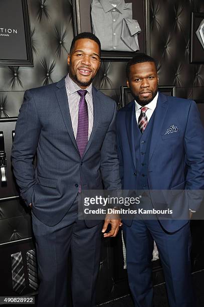 Personality Michael Strahan and Curtis "50 Cent" Jackson III attend JCPenney and Michael Strahan's launch of Collection by Michael Strahan on...