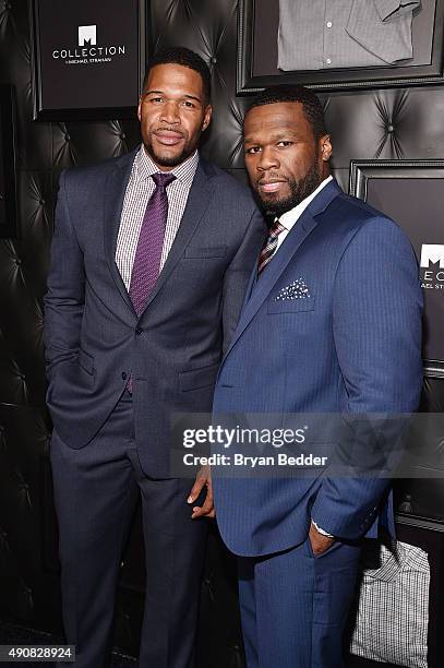 Personality Michael Strahan and Curtis '50 Cent' Jackson attend JCPenney and Michael Strahan's launch of Collection by Michael Strahan on September...