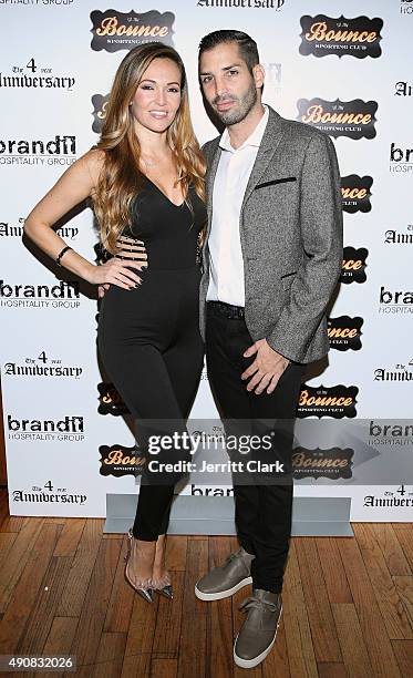 Tina Domingues and Cole Bernard attend the Bounce Sporting Club 4 Year Anniversary Party at Bounce Sporting Club on September 30, 2015 in New York...