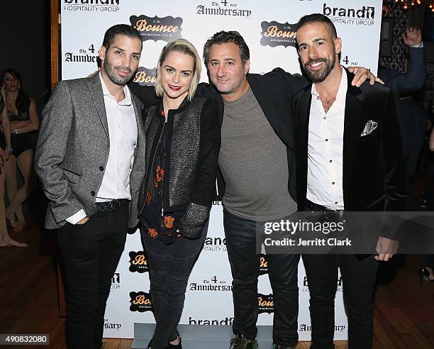 Taryn Manning poses with Bounce Sporting Club partners Cole Bernard, Benny Silmas and Yosi Benvenisti at the Bounce Sporting Club 4 Year Anniversary...