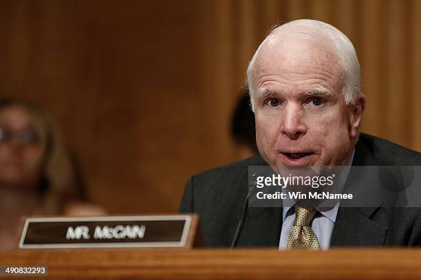 Sen. John McCain asks questions during a hearing held by the Senate Homeland Security Committee May 15, 2014 in Washington, DC. The committee heard...