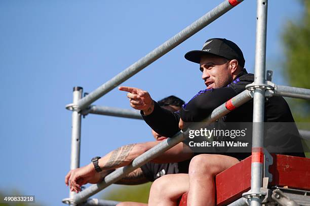 Maa Nonu and Liam Messam of the All Blacks watch from a tower during a New Zealand All Blacks Captain's Run at Sophia Gardens on October 1, 2015 in...
