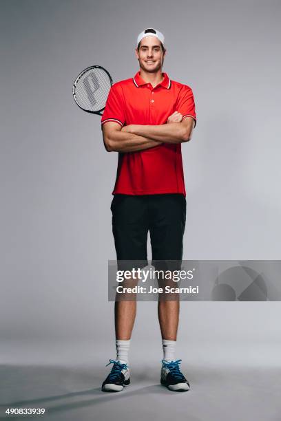 Tennis player John Isner is photographed for Self Assignment on November 27, 2012 in Bradenton, Florida.