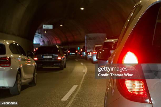 traffic in tunnel - traffic jam foto e immagini stock