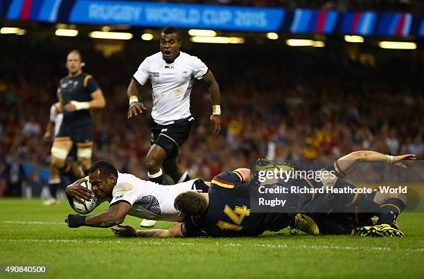 Vereniki Goneva of Fiji scores their first try during the 2015 Rugby World Cup Pool A match between Wales and Fiji at the Millennium Stadium on...