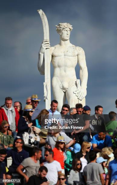 Fans watch on in front of a roman statue during day five of the Internazionali BNL d'Italia tennis 2014 on May 15, 2014 in Rome, Italy.