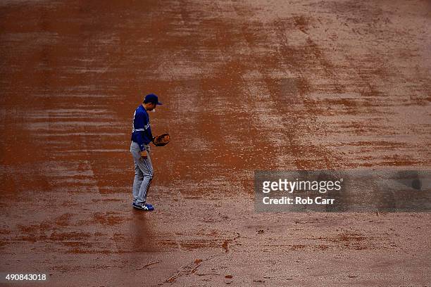 Third baseman Munenori Kawasaki of the Toronto Blue Jays looks on between pitches during the first inning against the Baltimore Orioles at Oriole...