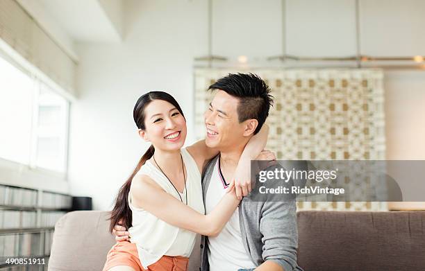 young chinese couple - cute girlfriends stockfoto's en -beelden