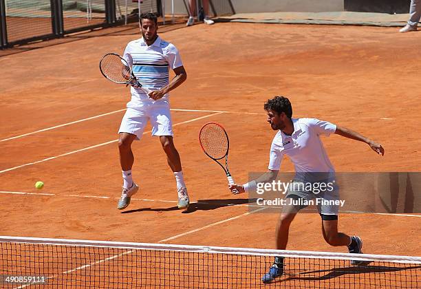 Feliciano Lopez of Spain and Robin Haase of Holland in action in the doubles against Treat Huey of Philiphines and Dominic Inglot of Great Britain...
