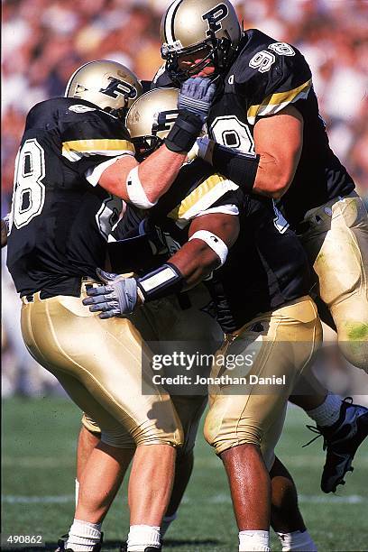 The Purdue Boilermakers celebrate on the field during the game against the Notre Dame Fighting Irish at the Ross-Ade Stadium in West Lafayette,...