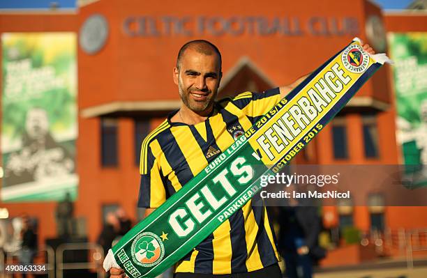 Fenerbahce supporter posses with a scarf during the UEFA Europa League match between Celtic FC and Fenerbahce SK at Celtic Park on October 01, 2015...