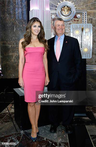 Elizabeth Hurley and William P. Lauder light the Empire State Building Pink at The Empire State Building on October 1, 2015 in New York City.