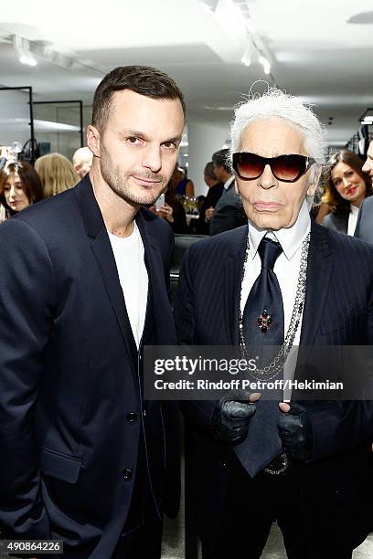 Designer Kris Van Assche and Designer Karl Lagerfeld attend the inauguration cocktail for the opening of Dior Homme Boutique on October 1, 2015 in...