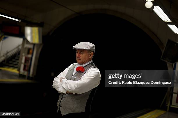 Chulapo' waits for a train on his way to Pradera de San Isidro park during the San Isidro festivities on May 15, 2014 in Madrid, Spain. During the...