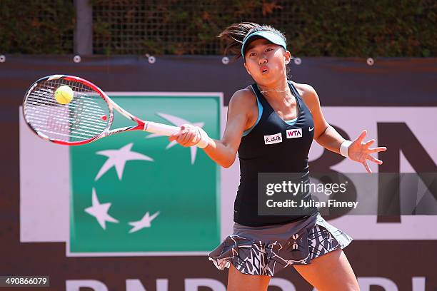 Shuai Zhang of China plays a forehand in her match against Christina McHale of USA during day five of the Internazionali BNL d'Italia tennis 2014 on...