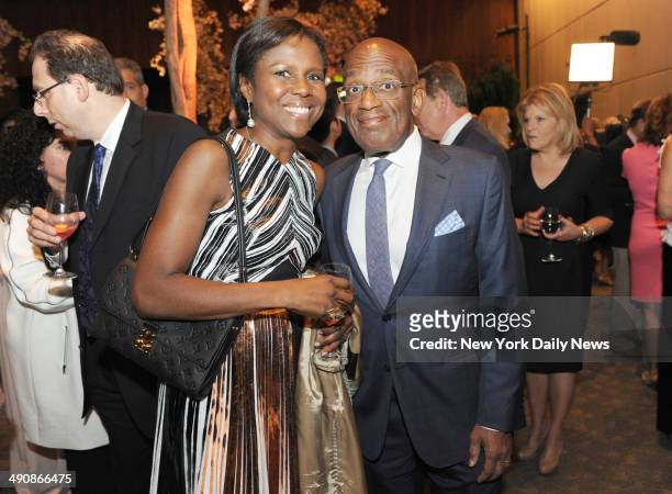 Cocktail reception in honor of Barbara Walters at the Four Seasons restaurant. Al Roker with wife Deborah Roberts