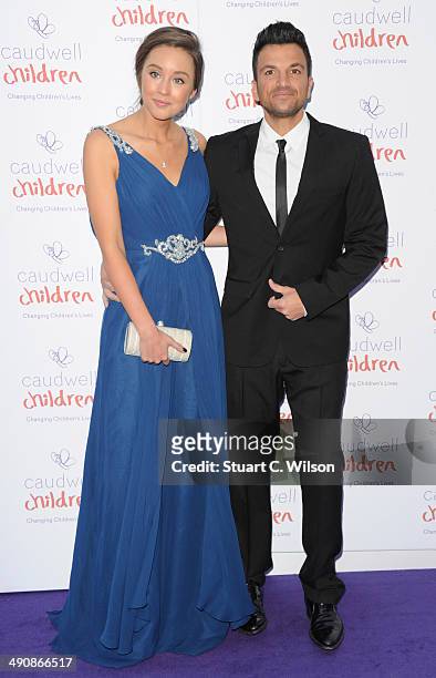Emily MacDonagh and Peter Andre attend the Caudwell Children Butterfly Ball at The Grosvenor House Hotel on May 15, 2014 in London, England.