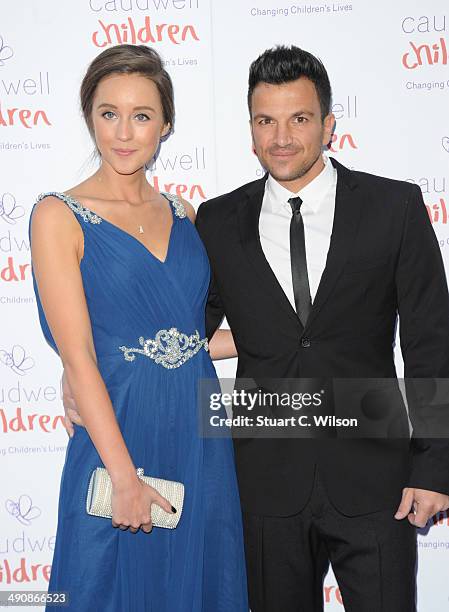 Emily MacDonagh and Peter Andre attend the Caudwell Children Butterfly Ball at The Grosvenor House Hotel on May 15, 2014 in London, England.