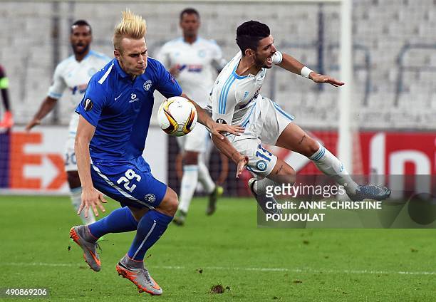 Liberec's defender Lukas Pokorny vies with Marseille's French midfielder Remy Cabella during the UEFA Europa League group F football match between...