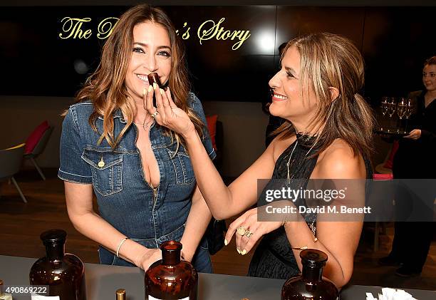 Lisa Snowdon and Azzi Glasser attend the Azzi Glasser Fragrance Launch at Harvey Nichols on October 1, 2015 in London, United Kingdom.